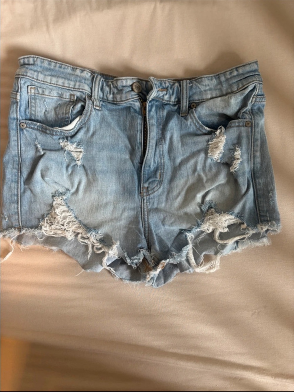 eunina Light Blue Distressed Denim Cutoff Shorts